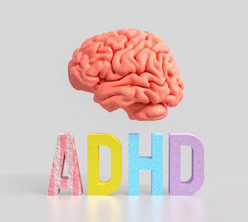 A close up of wooden blocks that spell ADHD. Learn more about the benefits of therapy for ADHD in Arlington, MA by contacting a child therapist. They can offer ADHD treatment in Arlington, MA can other services.