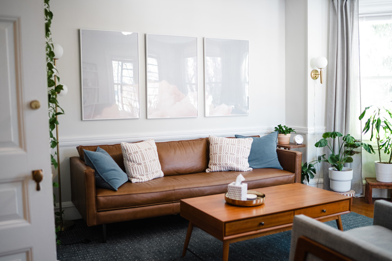 Relaxing space with green plants and a serene color scheme at Bain Health & Wellness Center