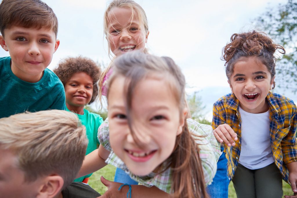 a group of children having fun outdoors